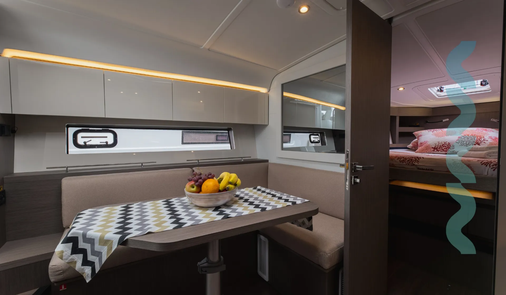Saloon dining area with cabin view